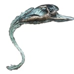 A close-up of the bronze relief sculpture "Freestyle," showing intricate details of the swimmer's body and the fluid motion of water-like textures extending around the figure. The green and bronze patina emphasizes the aquatic theme.