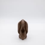An abstract alien figure molded from clay by Marka Kiley