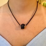 silver and leather triple wrap knot pendant necklace by studio jeweler Timo Krapf