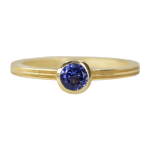 Round tanzanite ring with a fluted band by Fringe Gallery studio jeweler Barbara Heinrich