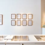 Series of framed blue thread on paper works by Fringe Gallery artist Rebecca Messier