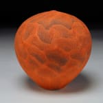 bright red earthenware vessel by potter Nicholas Bernard