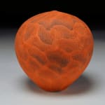 bright red earthenware vessel by potter Nicholas Bernard