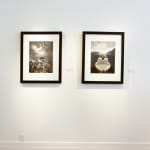 Silver Gelatin Print of hands holding water in front of a mountain landscape by Fringe Gallery artist Jerry Uelsmann