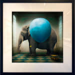 Archival Inkjet Print of The Surprise by Slate Gray Gallery Artist Maggie Taylor in a black frame