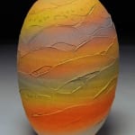 tall earthenware vessel with sunset bands of color by potter Nicholas Bernard