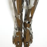 Stainless steel sculpture of a person sitting upright by slate gray gallery artist David Davis