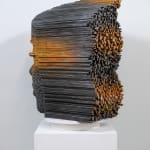 "Mind Bending" a sculpture of a face made from wooden sticks and paint by slate gray gallery artist Gil Bruvel
