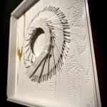 "Whiteout" a wood wall sculpture painted mostly white with a gold accent by slate gray gallery artist cie hoover