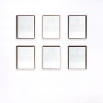 Series of framed white thread on paper works by Fringe Gallery artist Rebecca Messier
