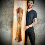 Wood wall Sculpture by slate gray gallery artist Cie Hoover