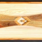 Wood wall Sculpture by slate gray gallery artist Cie Hoover