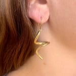 Gold Single Swirl Earrings by Slate Gray Gallery studio jeweler Timo Krapf
