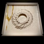 "Whiteout" a wood wall sculpture painted mostly white with a gold accent by slate gray gallery artist cie hoover