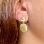 Gold double petal earrings with 14 diamonds by Fringe Gallery studio jeweler Barbara Heinrich