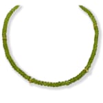 Green necklace with gold beads
