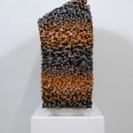 "Mind Bending" a sculpture of a face made from wooden sticks and paint by slate gray gallery artist Gil Bruvel