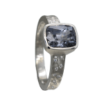 Grey spinel stone in platinum band with diamonds by studio jeweler Barbara Heinrich (side view)