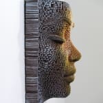 "Mask #178" a sculpture of a face made from wooden sticks and paint by slate gray gallery artist Gil Bruvel