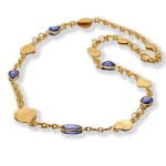 Gold Petal Necklace with Blue Sapphires by Slate Gray Gallery studio jeweler Barbara Heinrich