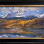 Pastel painting in a black frame of a mountain range with a body of water in front of it by Slate Gray Gallery artist Bruce A. Gomez