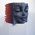 "Sphinx" a sculpture of a face made from wooden sticks and paint by slate gray gallery artist Gil Bruvel