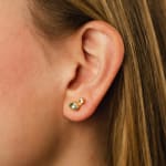 22k and 18k yellow gold stud earrings bezel set aquamarine by Fringe Gallery studio jeweler Petra Class.