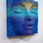 "Mask #96" a sculpture of a face made from wooden sticks and paint by slate gray gallery artist Gil Bruvel