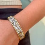 Gold bangle with mixed colored and shaped diamonds
