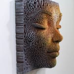 "Mask #178" a sculpture of a face made from wooden sticks and paint by slate gray gallery artist Gil Bruvel