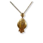 Brown diamond fish necklace by slate gray gallery studio jeweler nayla arida