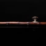 Large Antique Chinese Opium Pipe in Bamboo, Horn and Jade. The Long Stem ends in a Clenched Hand, holding a...