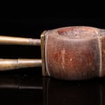 Old Bamboo Opium Pipe, with visible Knot of the Bamboo. The Mouthpiece and Furnace are in Bronze. The Piece comes...