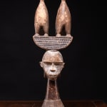 Idoma Crest mask topped topped with build-up double mouth structure., interbellum