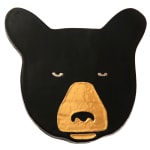 Lorien Stern - ceramic flat panel of a black bear head.