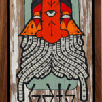 GATS character with long white tentacles and a red and orange beard on a wooden background