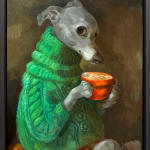 dog wearing a green sweater holding a coffee mug