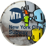 yellow, baby blue, silver, green, red robots against a MTA New York City Subway train badge