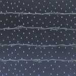 Painting of 4 rows of barbed wire on a dark night sky with bright blue and white rain drops falling from the sky by John Slaby