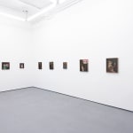 Install photo of Alison Friend's paintings hanging on a white wall