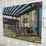 Painting by Valeri Larko of an abandoned room on wal