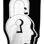 embroidered black and white banner of a padlock in the shape of a human head