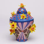 Amber Jean Young - ceramic sculpture of a abstract shape pattern vase and red dots on blue lid with yellow flowers.