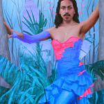 Painting of a person with long dark hair and facial hair. They are wearing a corset dress. In the background is tall grass.