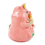 Katie Kimmel's ceramic sculpture of a pig holding flowers