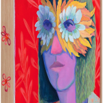 Genevieve Cohn painting of purple woman on red background, wearing feather eye mask in natural wood frame with red floral accents