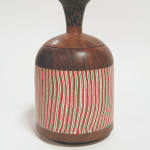 Miles Robinson - wooden vessel with red and white vertical stripes