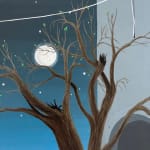 detail shot of the moon and tree branches