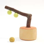 CHIAOZZA - sculpture of pigmented paper pulp pale peach base and yellow sphere with apple tree branch