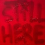red canvas with the words "Still Here" and a robot figure